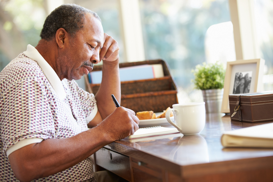 Senior Man Writing Memoirs